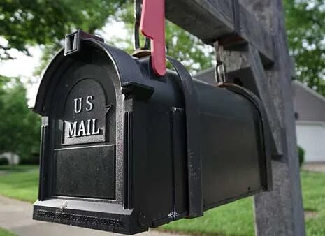 A black United States mail box illustrating absentee voting by mail in Ohio